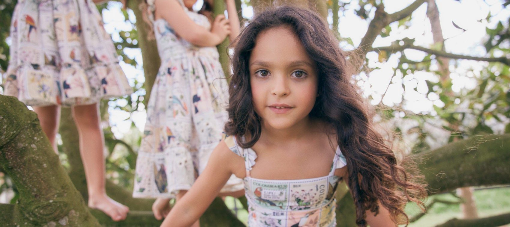 girl climbing a tree