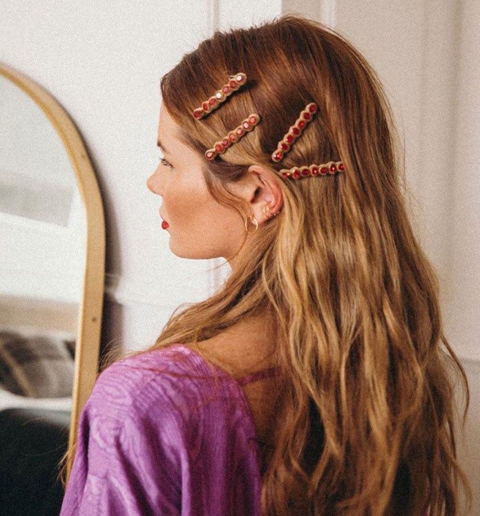 Woman with bejeweled bobby pins