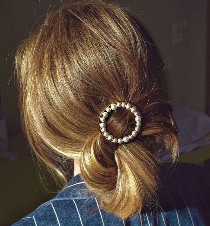 Woman with a pearl barrette