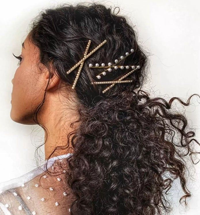 Woman with bobby pins in her hair