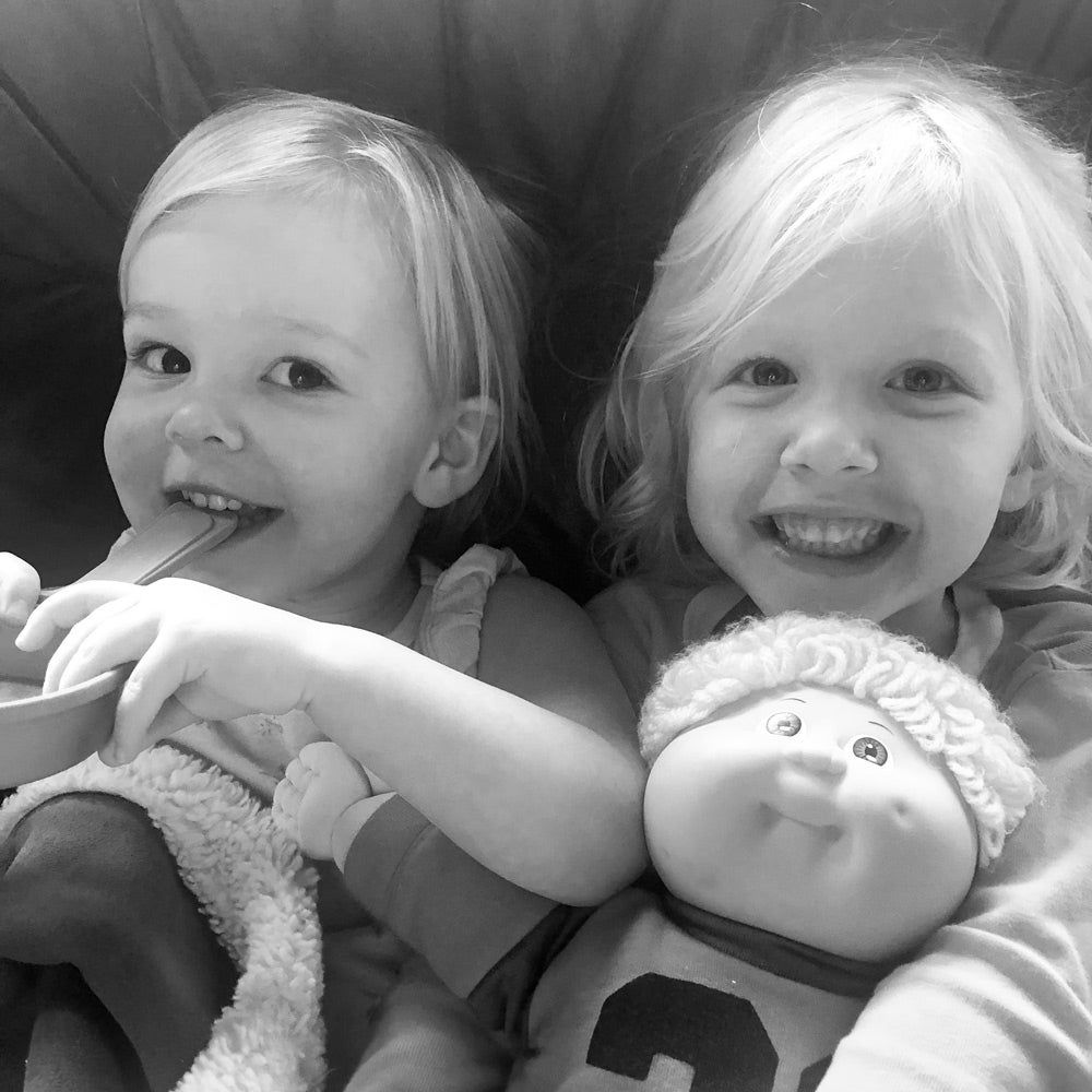 two little girls smiling