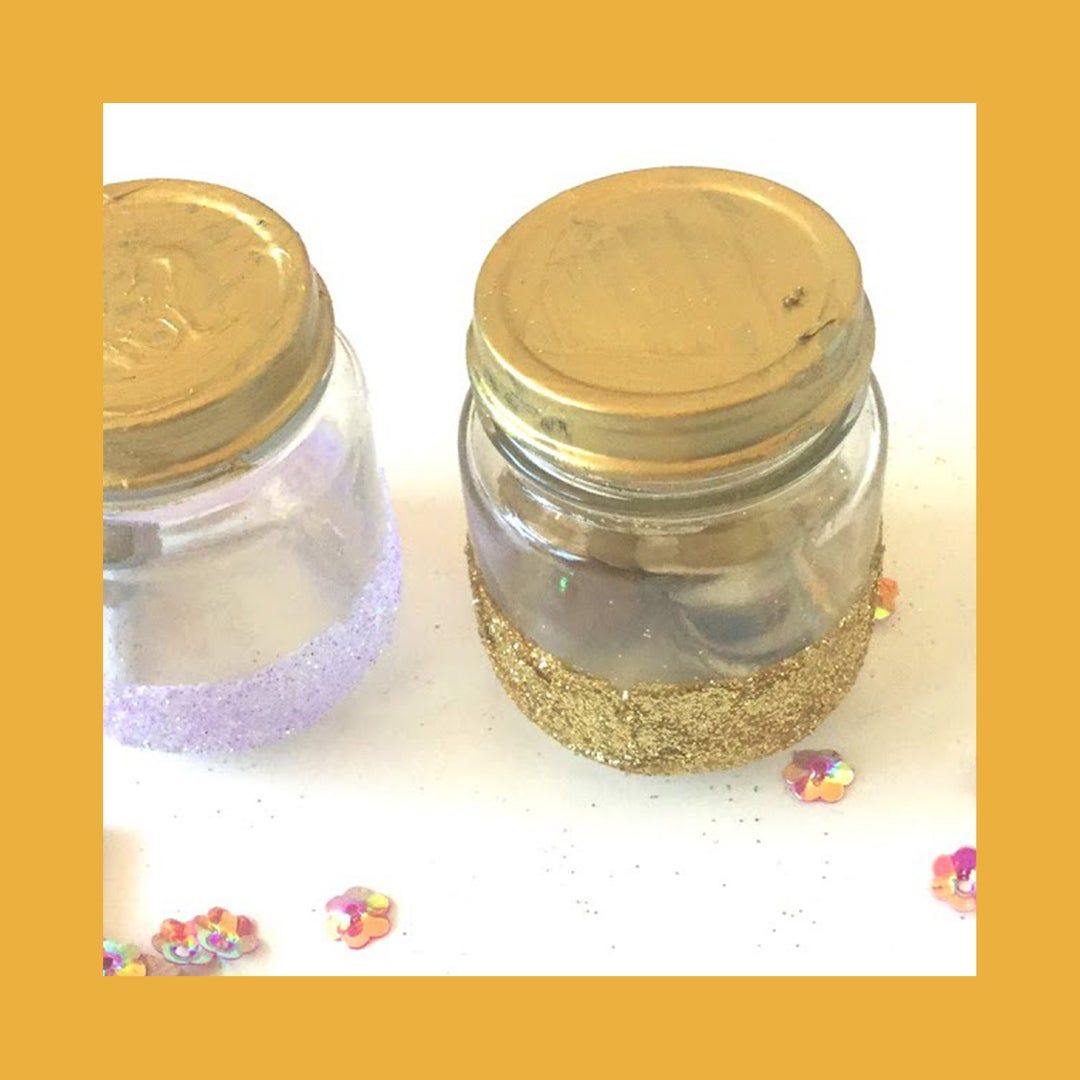 Glass jar with gold painted top and glitter bottom