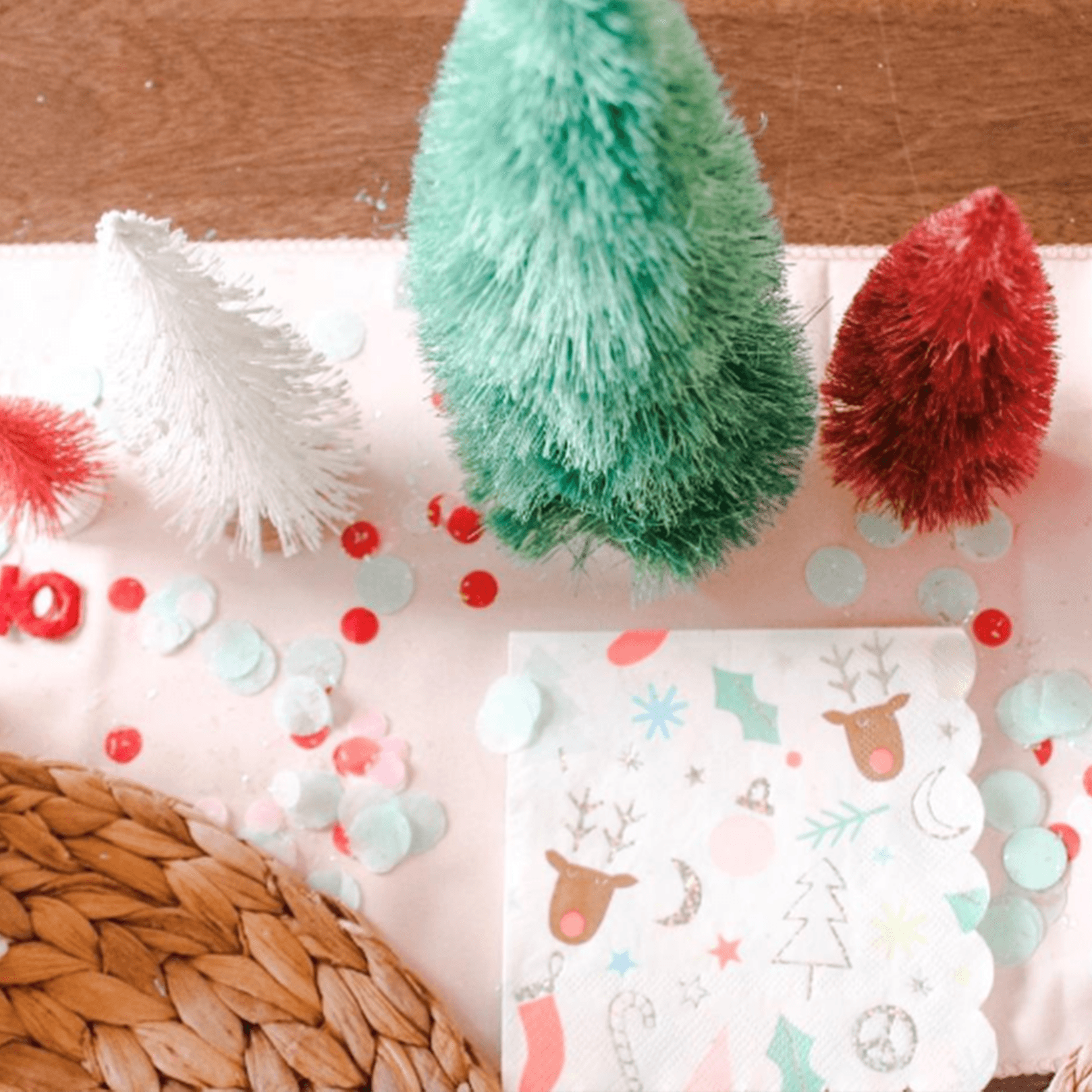 Kara Cofield kids' Christmas table with bottle brush trees
