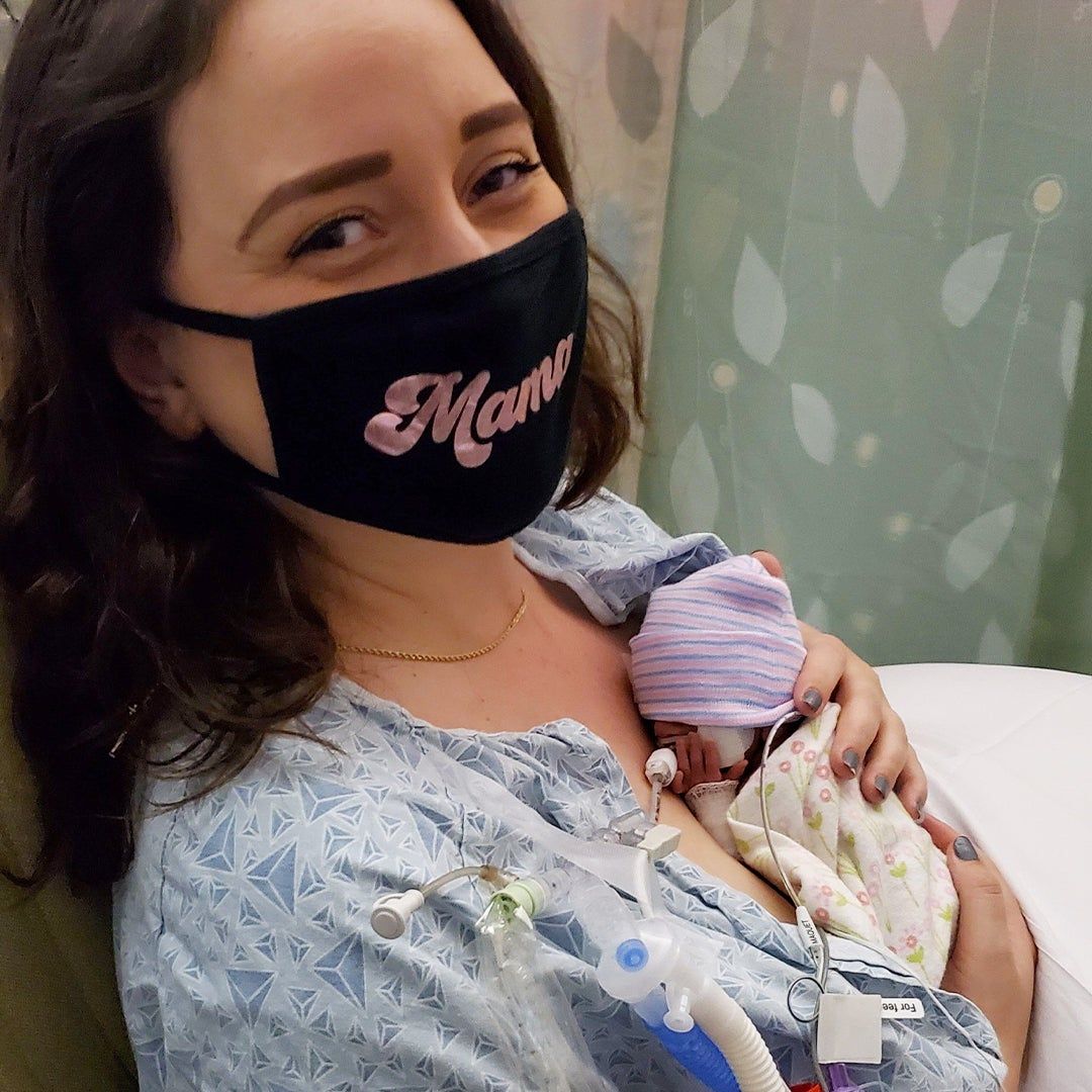 Premature baby Gracie in an incubator, Mother Britni holding baby Gracie
