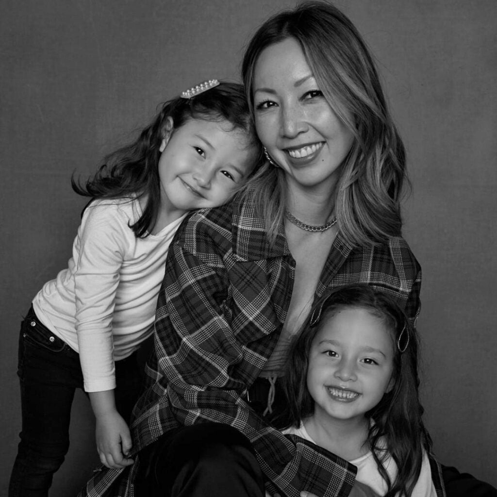 black and white photo of Bee Shapiro with her daughters Ellis and Sky