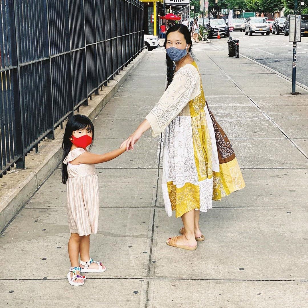 Joyce Lee with her daughter on New York sidewalk