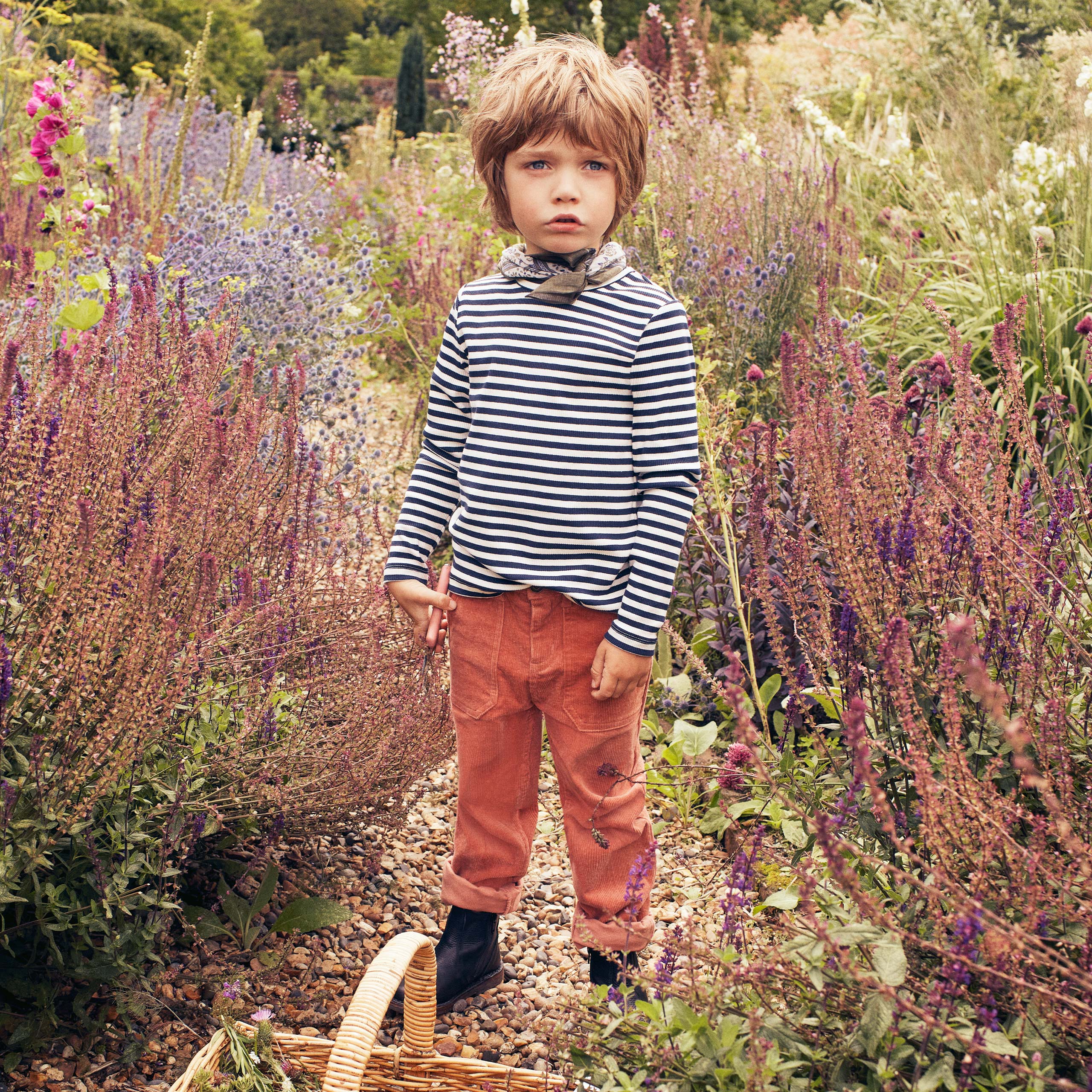 Boy wearing Cambpell Pants in a garden