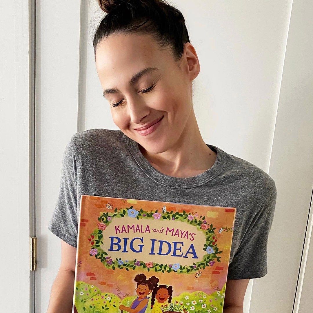 Meena Harris holding her book, "Kamala and Maya's Big Idea"