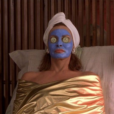 woman with a face mask at a spa 