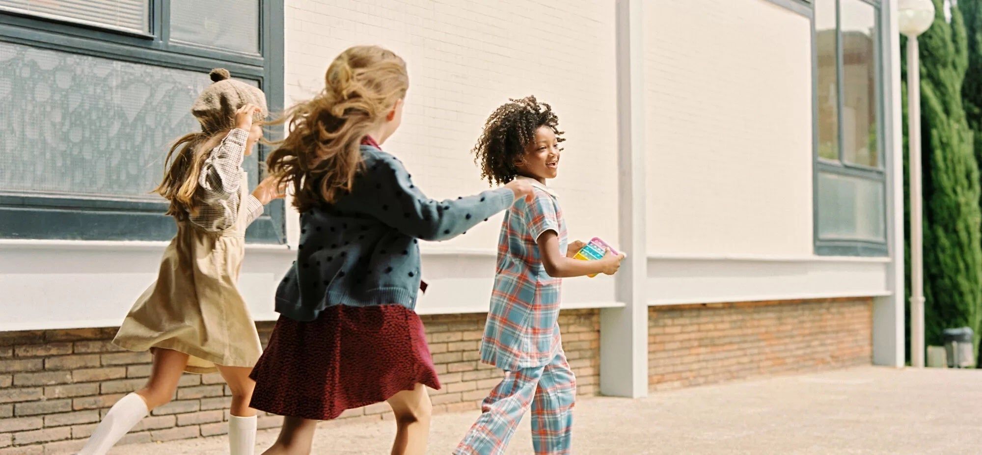 kids running into school