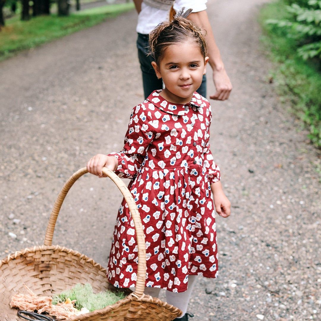 Bela's daughter playing chess and walking outside