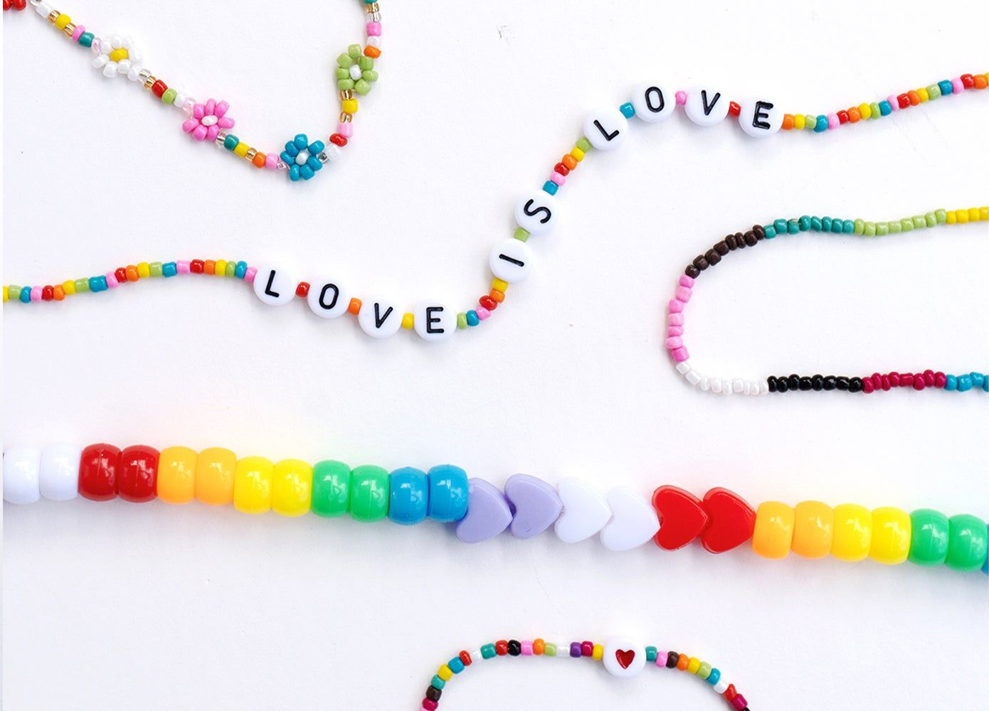 5 Beaded Rainbow Pride-Themed "Allyship" Bracelets