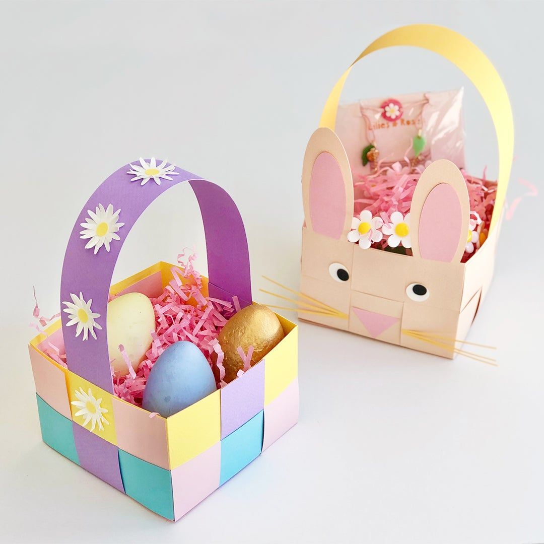Two spring-themed baskets made of woven strips of paper
