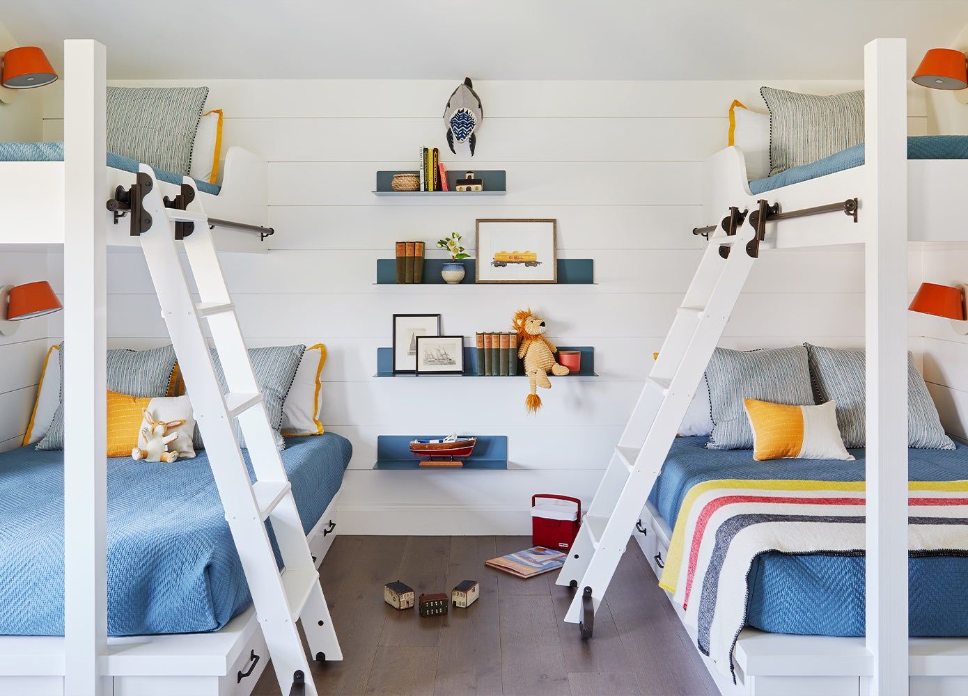 two sets of bunk beds in a child's room