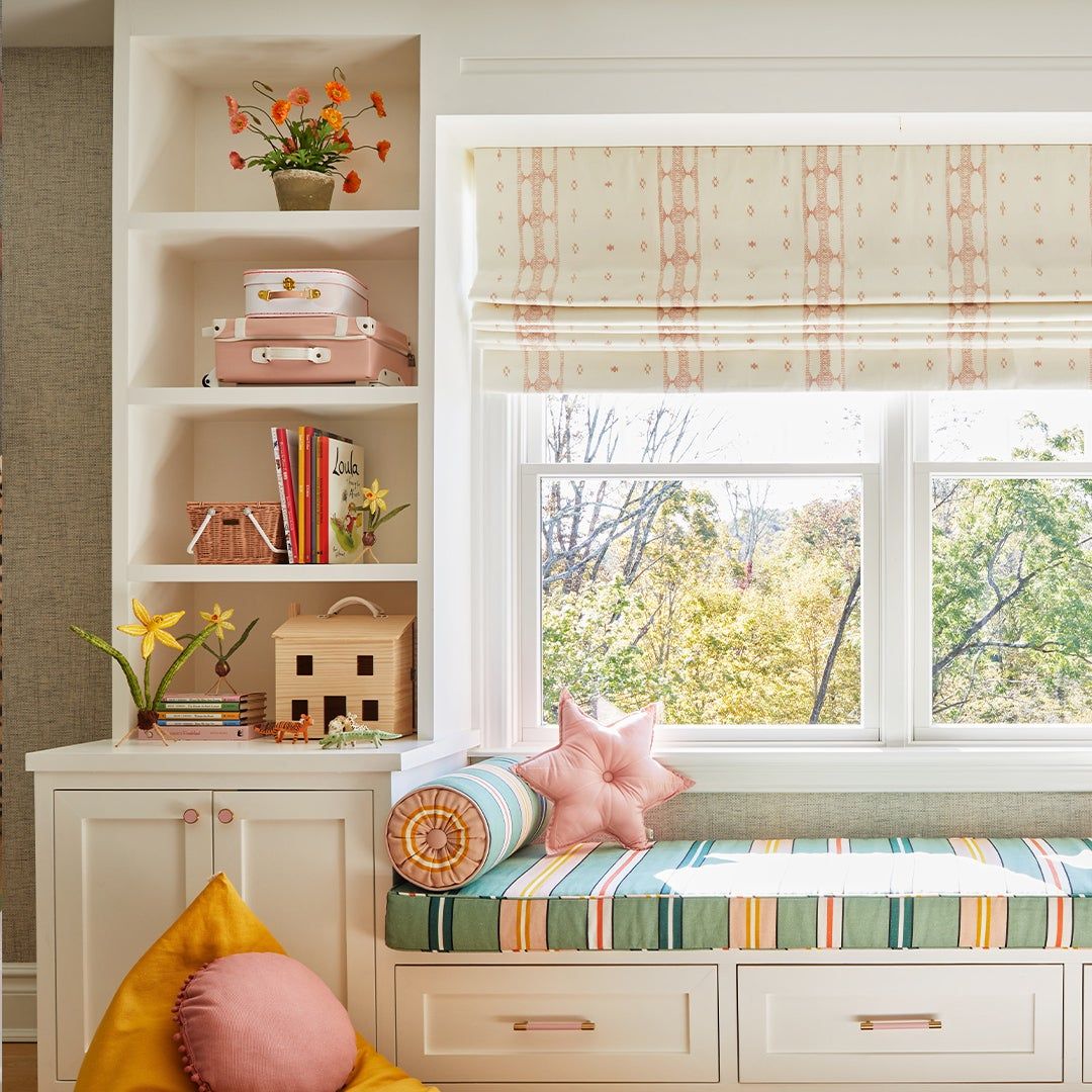window seat with colorful striped fabric