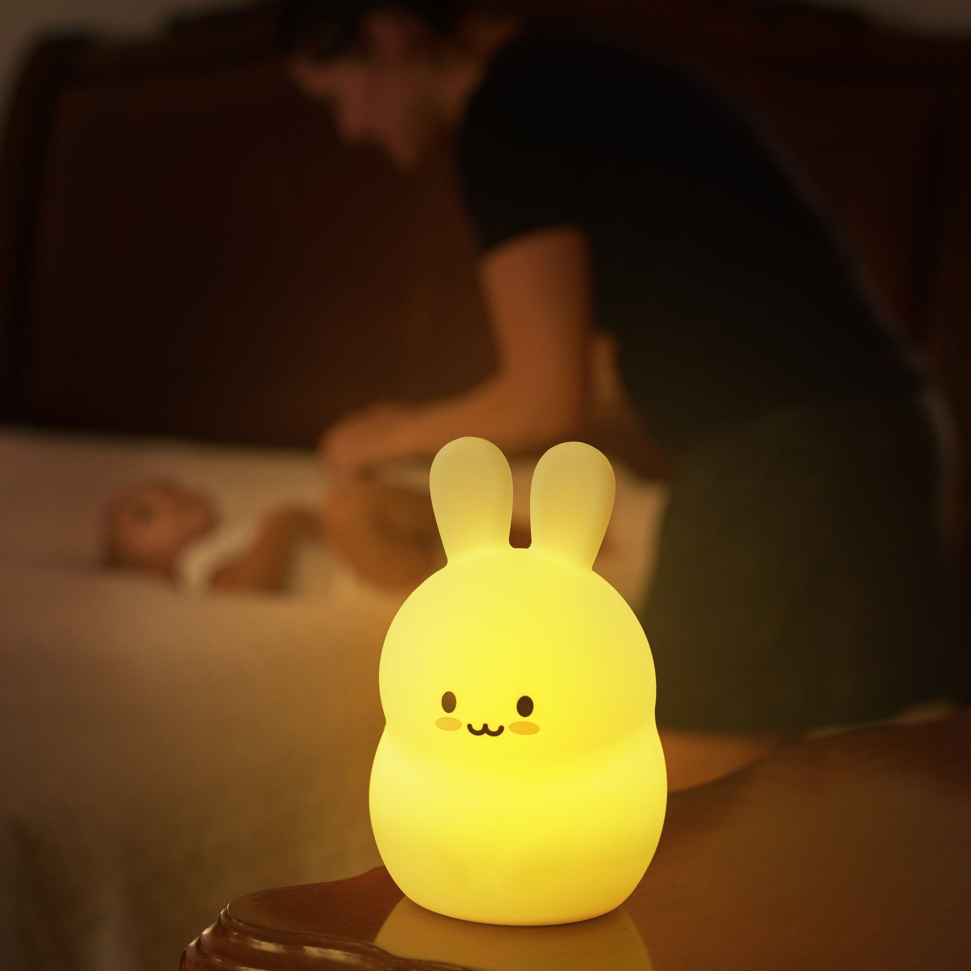boy holding a night light a good gift for a neurodiverse child