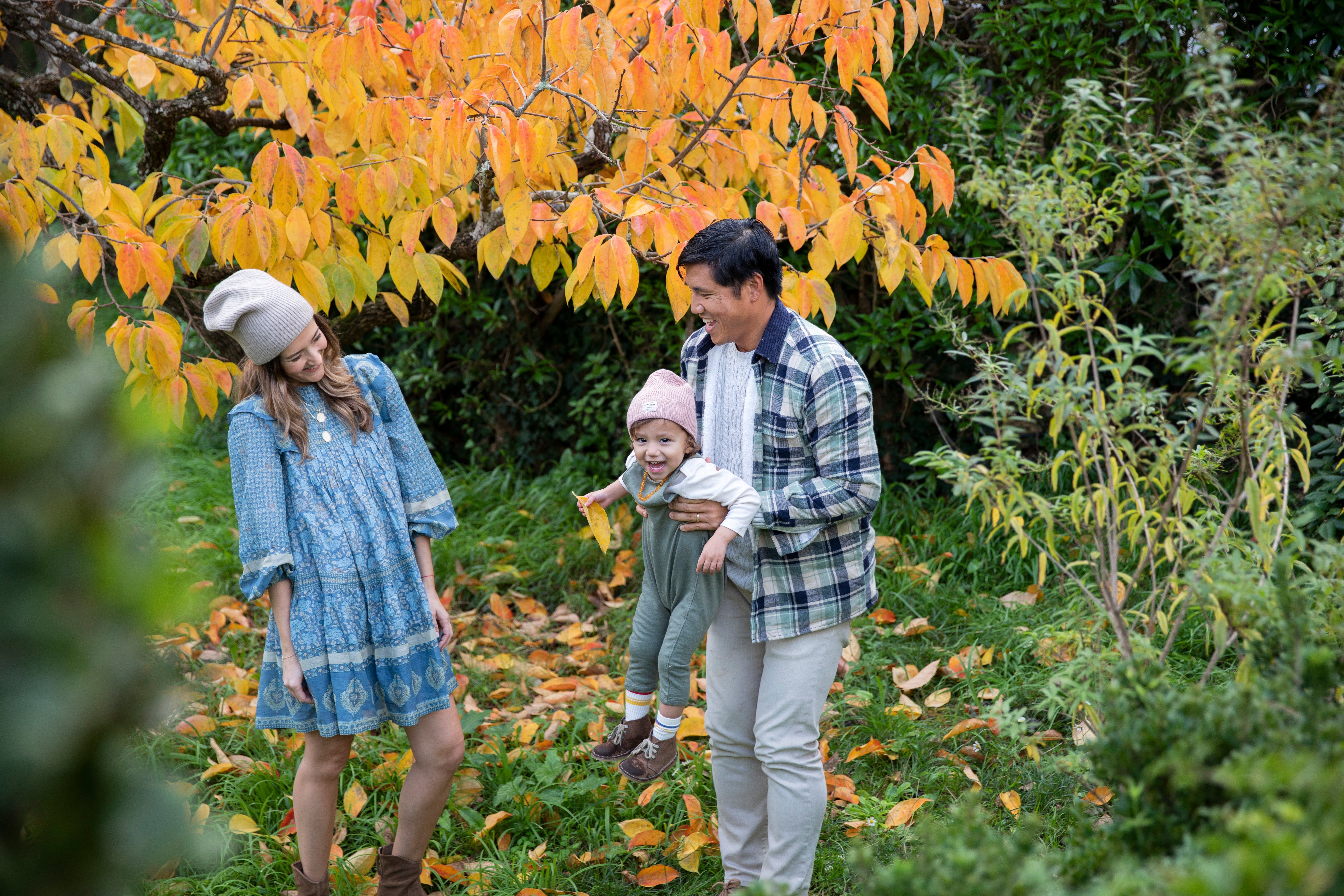 Yee family playing in the leaves in Mallorca