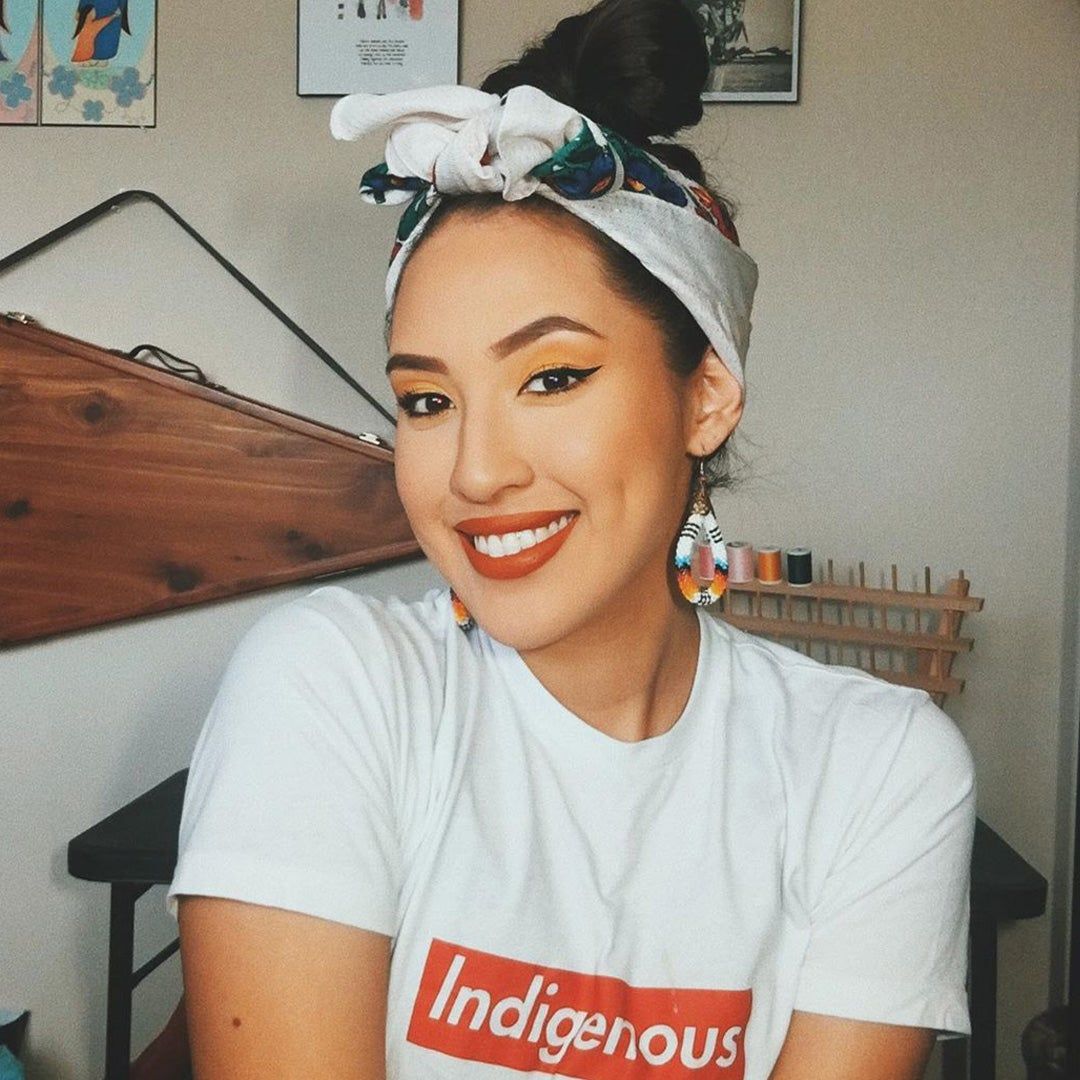 Erica Moore in a shirt that reads "Indigenous"