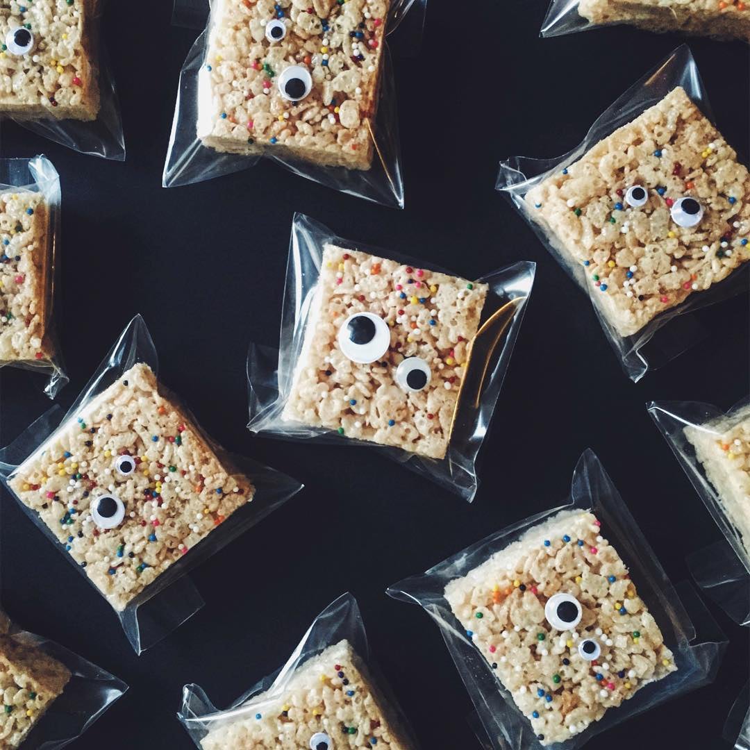 Halloween treats for school that are individually wrapped Rice Krispie treats with rainbow sprinkles and google eyes