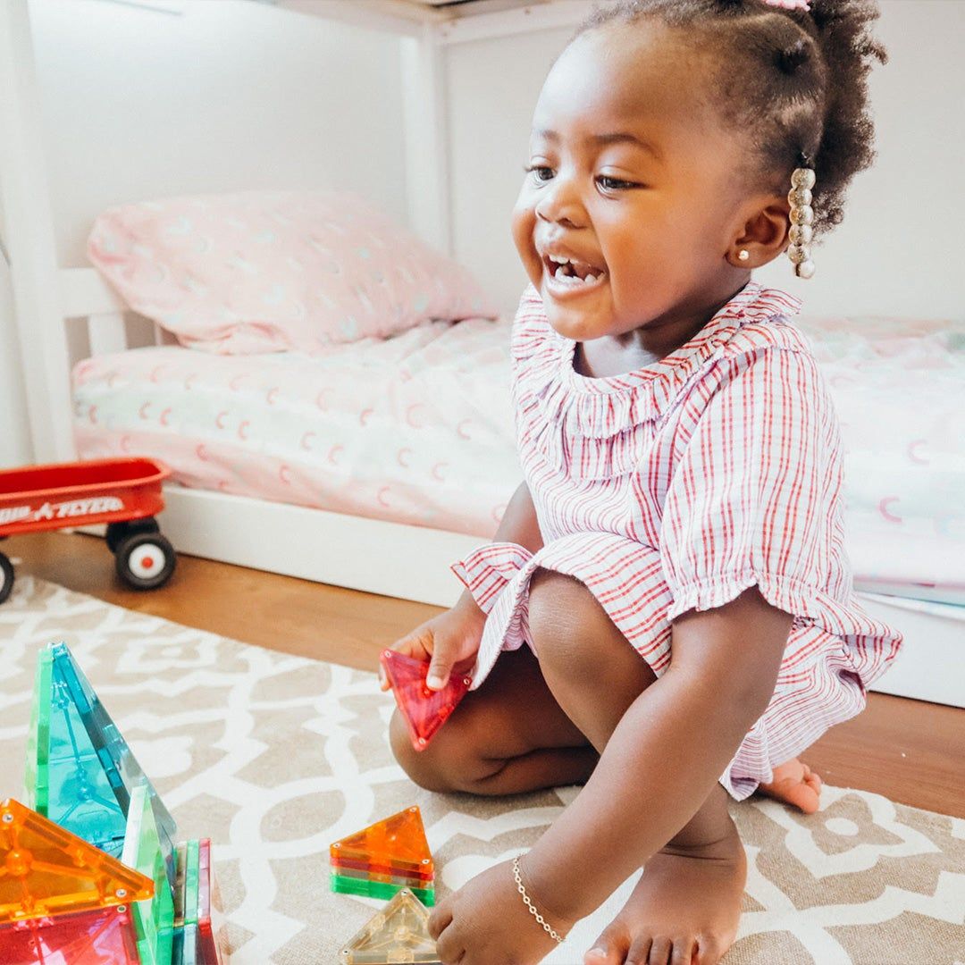 Geena's daughters playing with toys