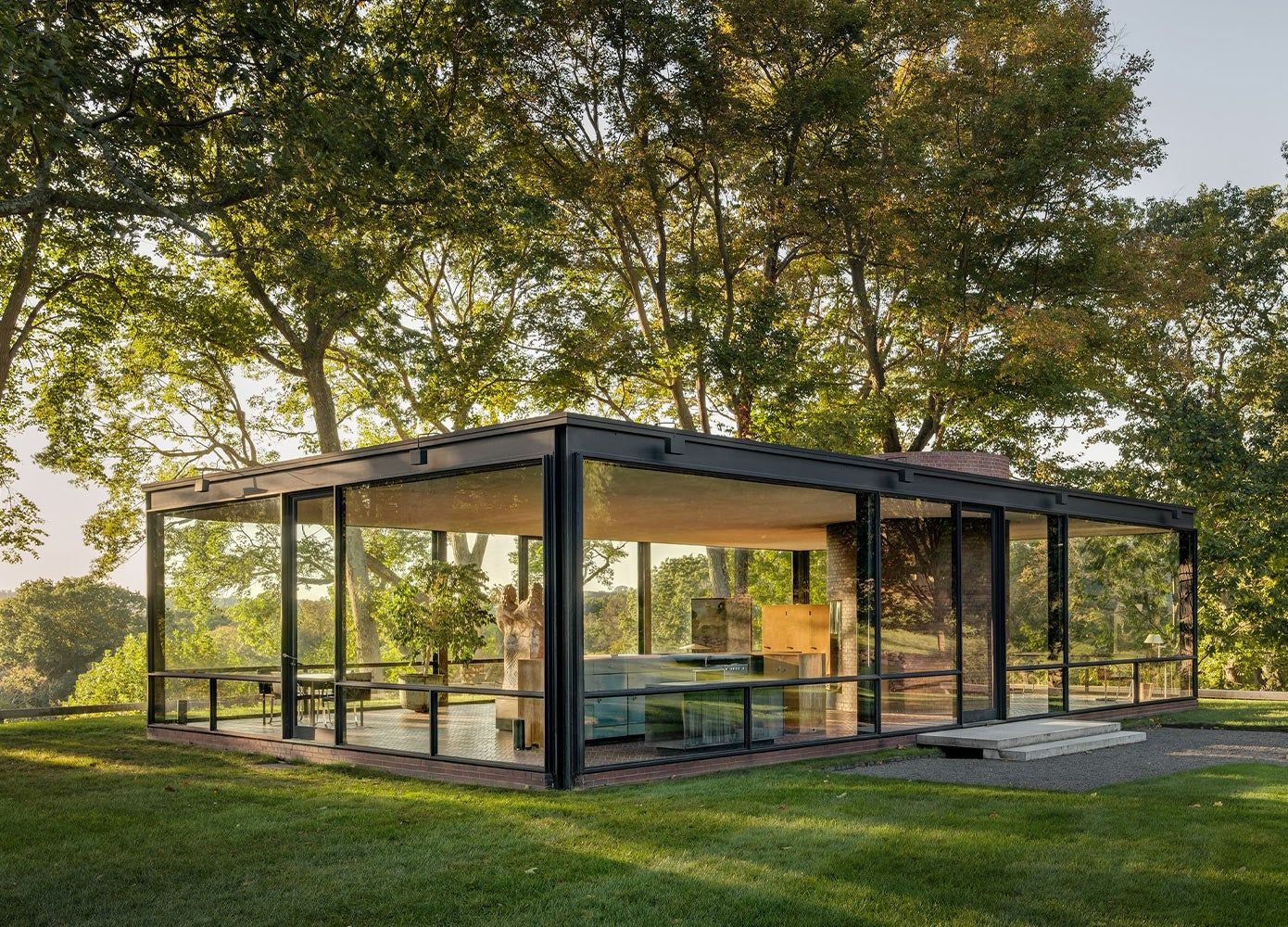 The Glass House built by Philip Johnson viewed from the side.