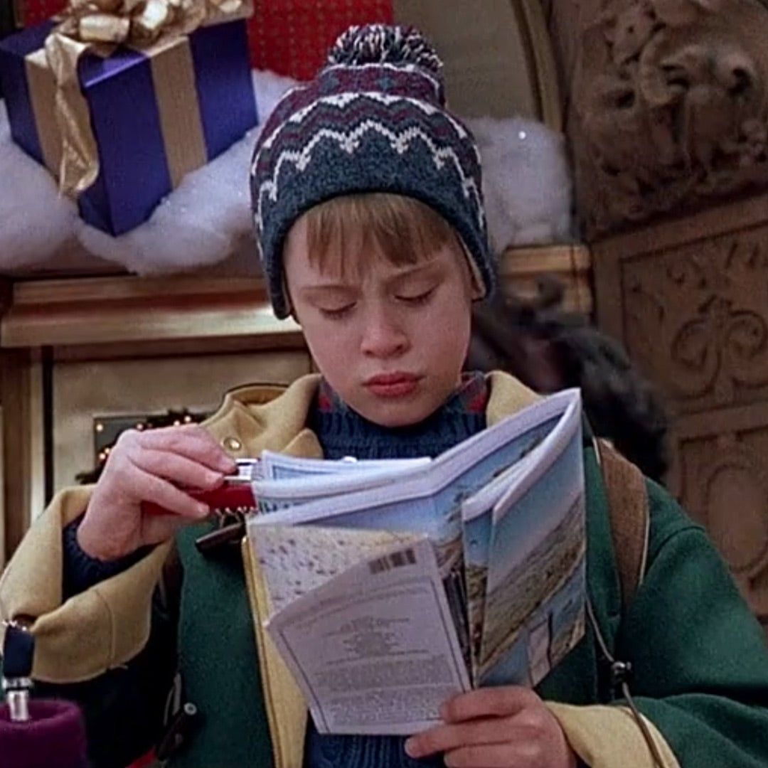 From Home Alone 2, Kevin looking at a map alone in NYC
