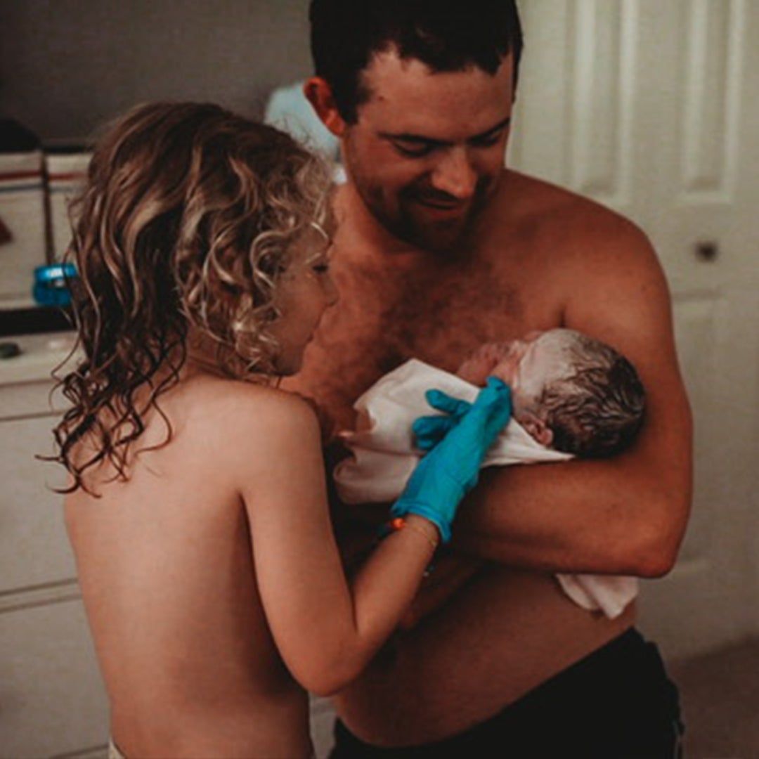 catching newborn baby Ziggy
