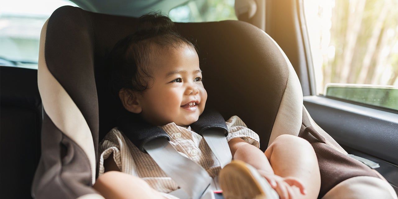 toddler in a car seat 