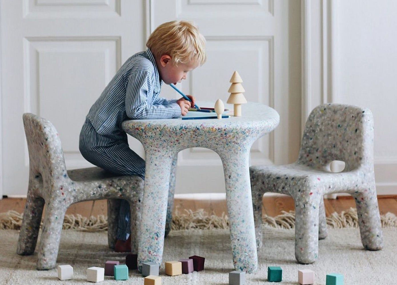 child at small table