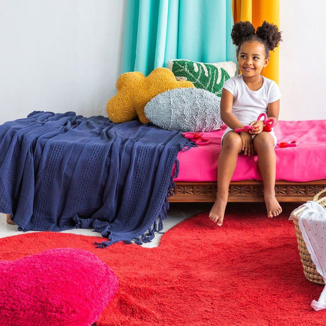 young girl on her bed