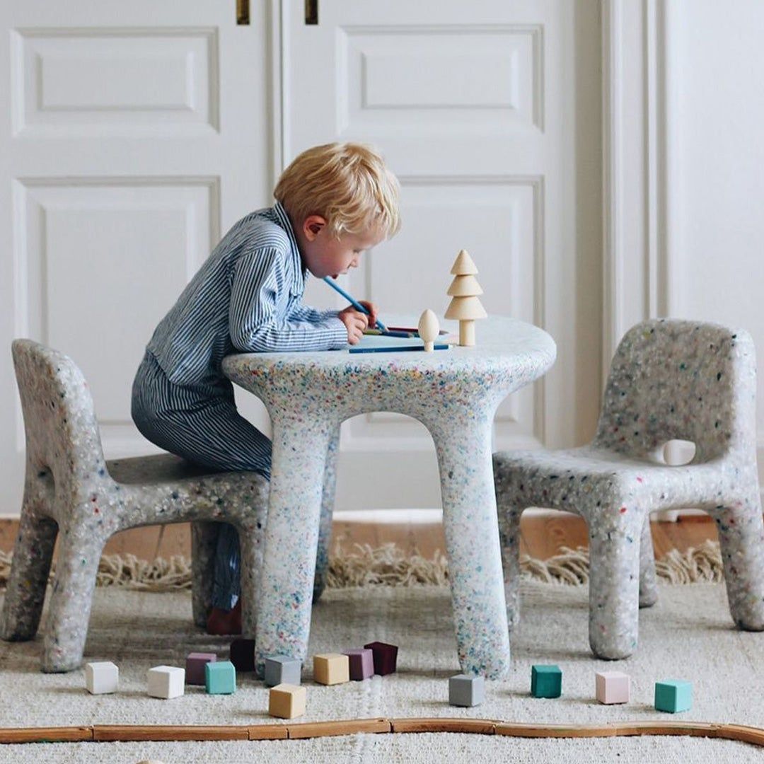 child at small table
