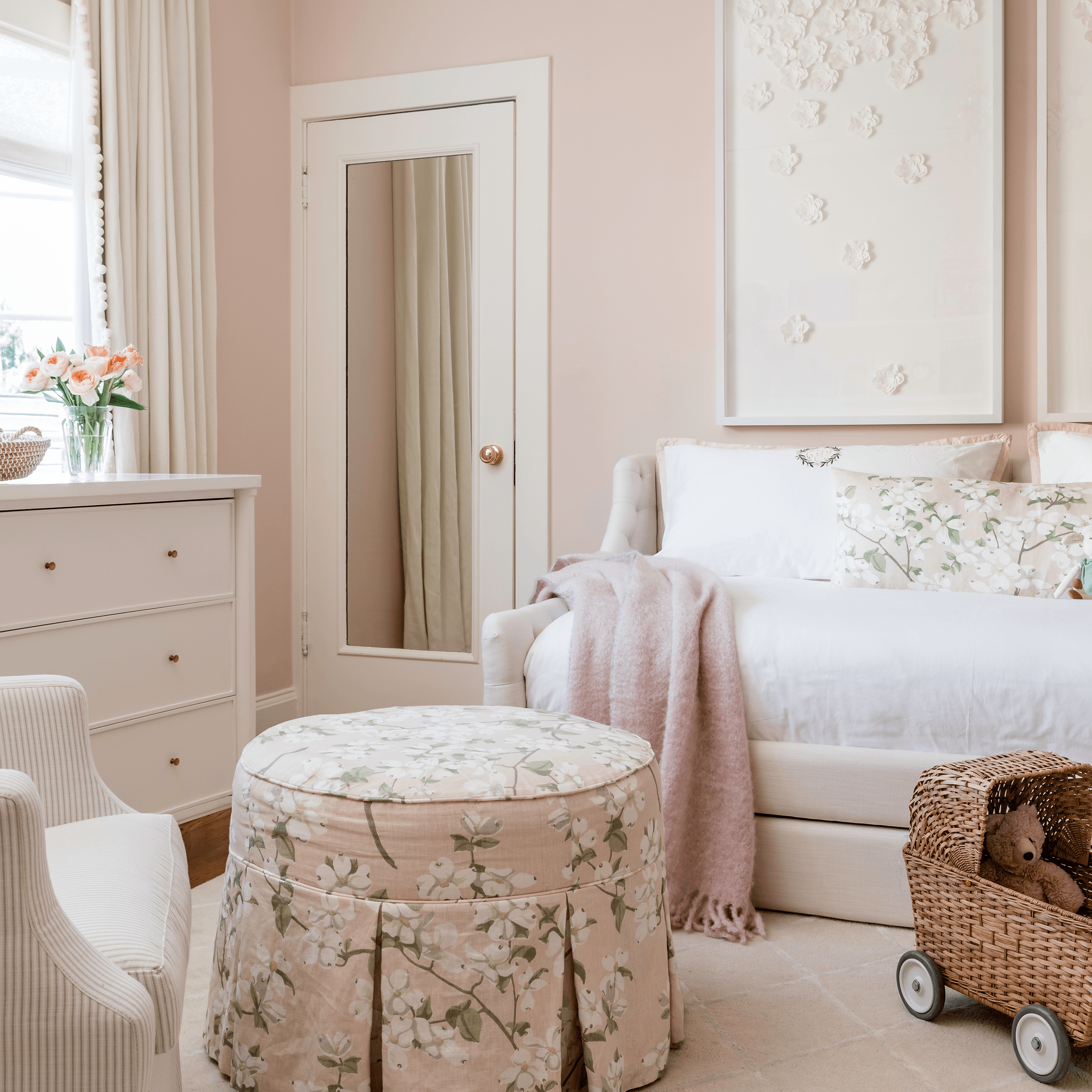 pink child's room with cozy furniture