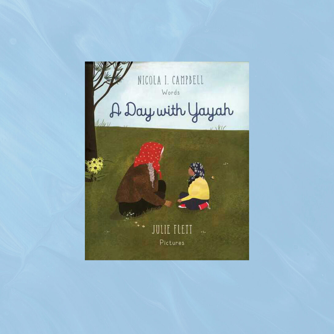 cover of A Day with Yayah featuring a young girl and an elder in the grass