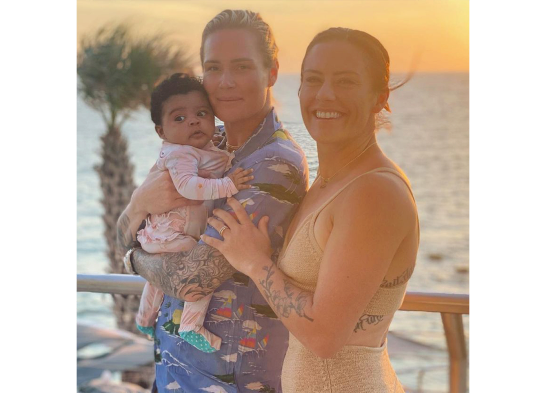 Ali Krieger and Ashlyn Harris with their baby