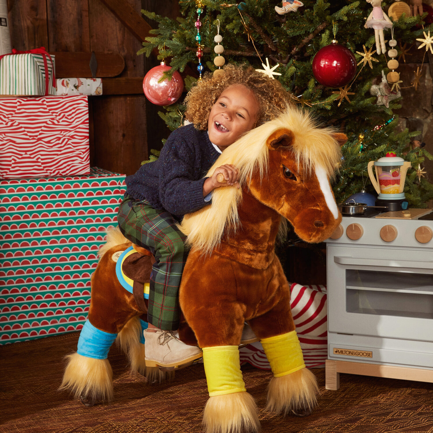 a boy and his rocking horse Christmas gift