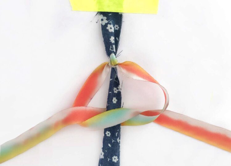 knotting a bracelet tying a square knot