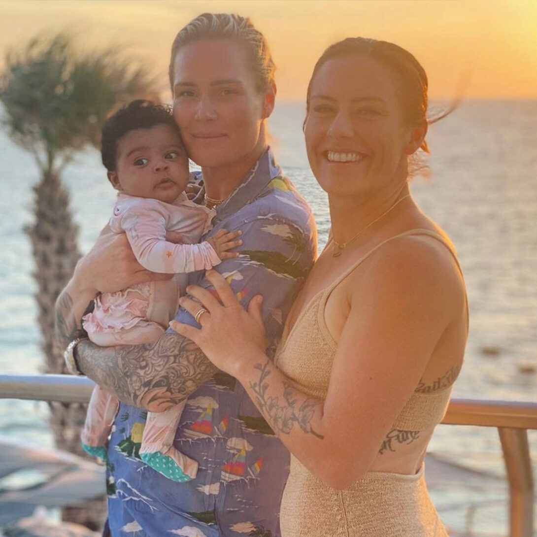 Ali Krieger and Ashlyn Harris with their baby