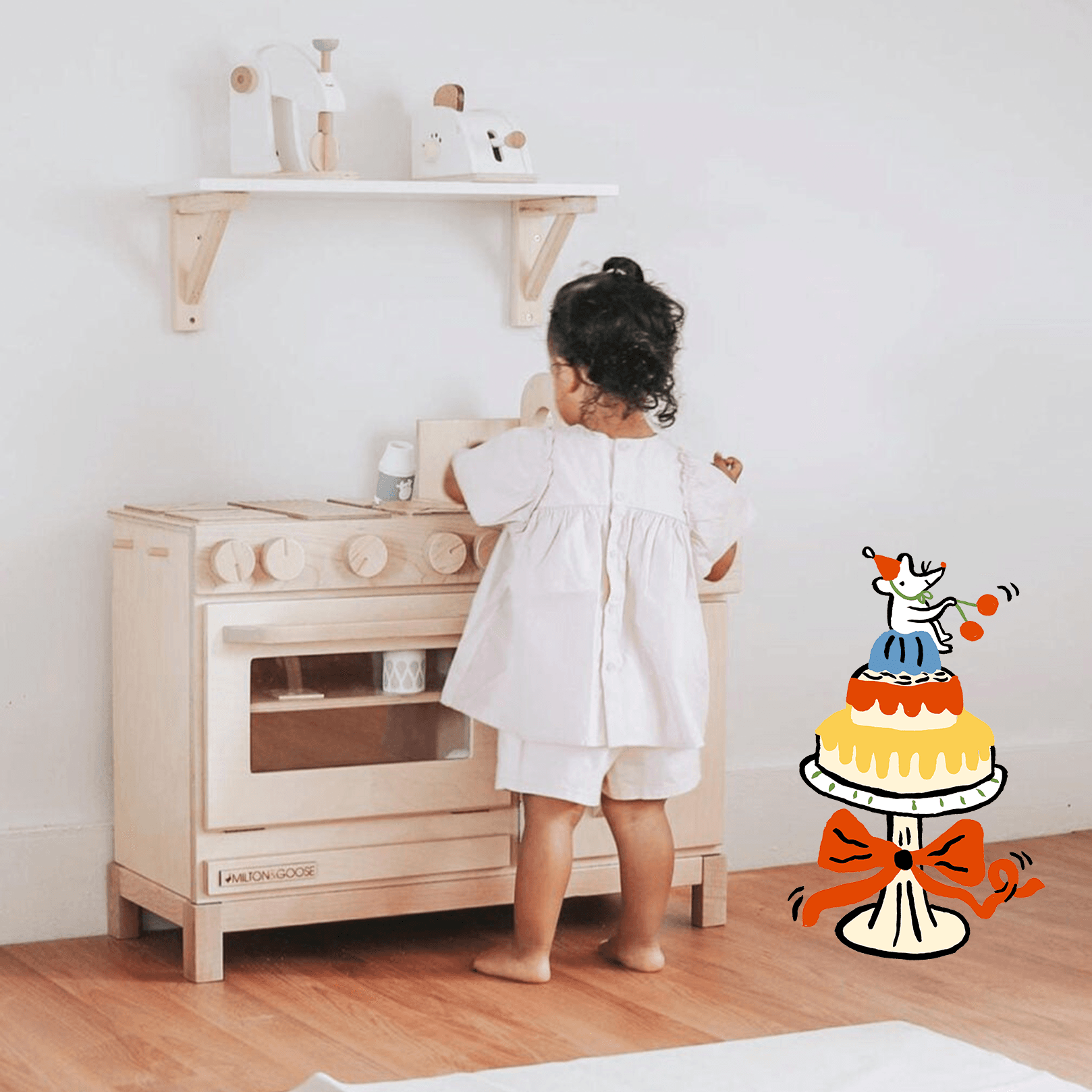 Child playing with a Milton & Goose play kitchen