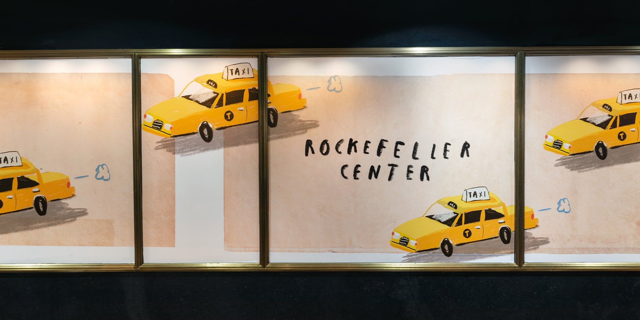 Oliver Jeffers Illustrations of Taxis in a window at Rockefeller Center