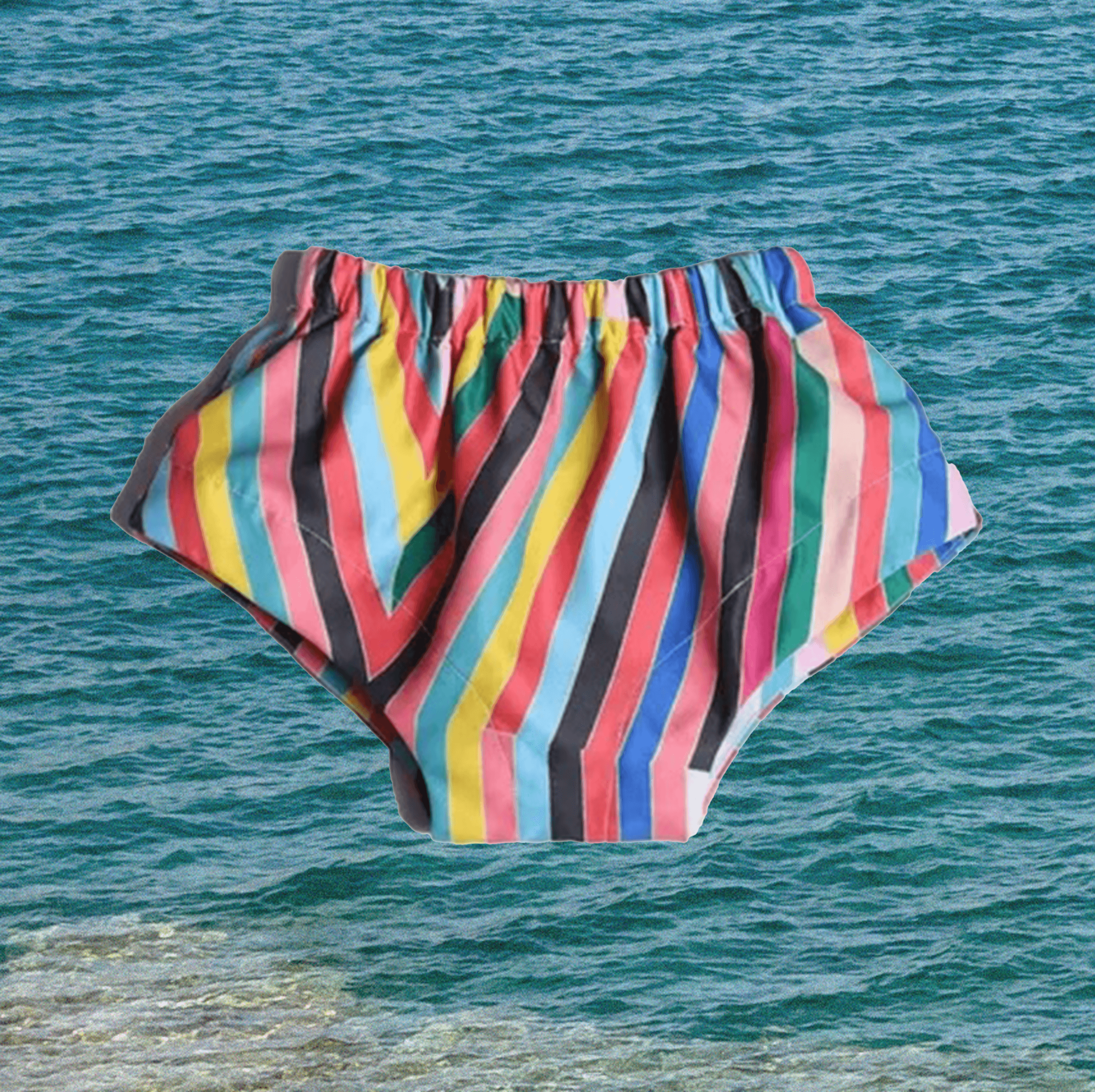 swim diaper and swim diaper covers for babies at the beach
