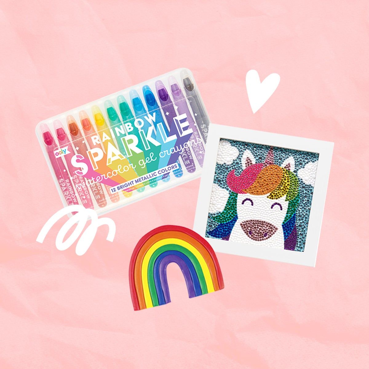 Assorted crafts from OOLY on a pink background