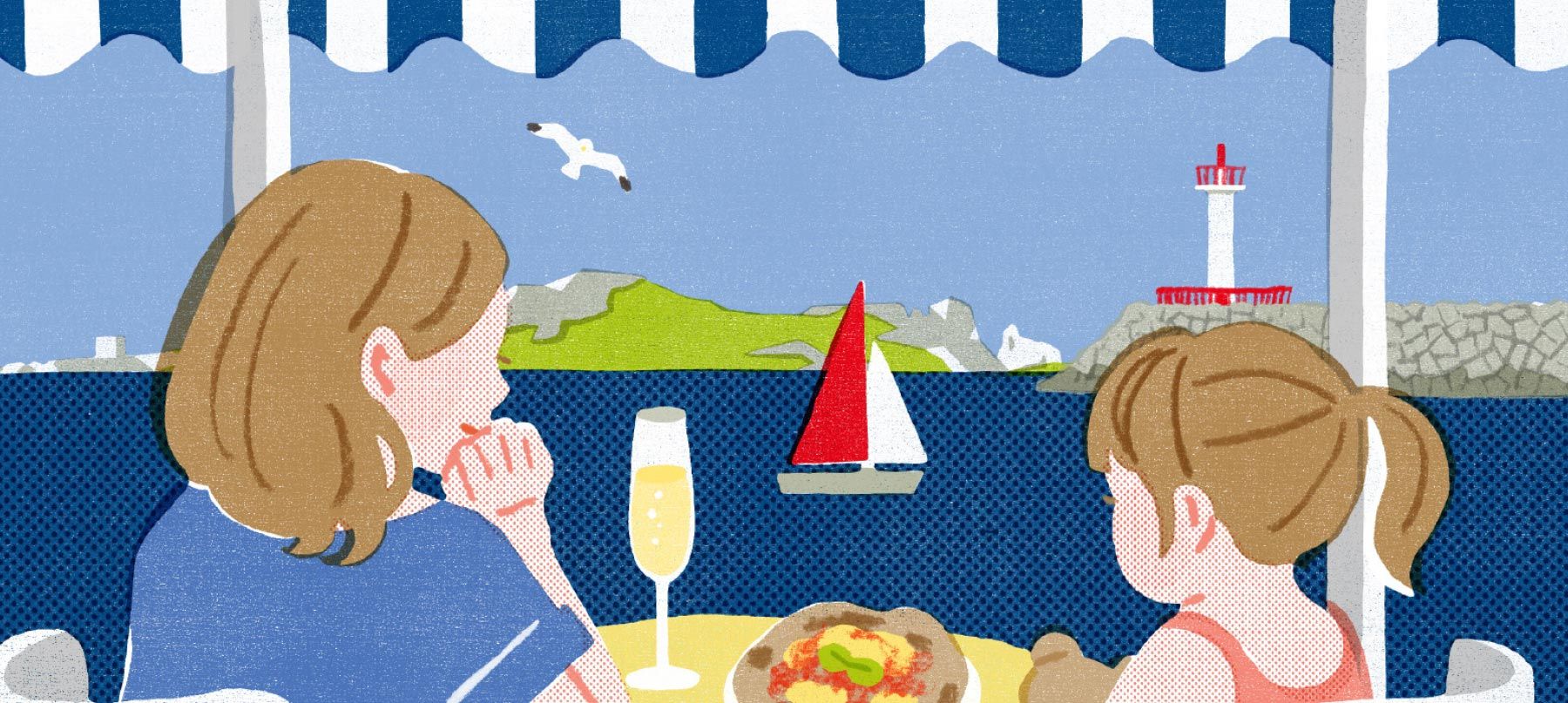 single mother and child eating a meal together at the beach