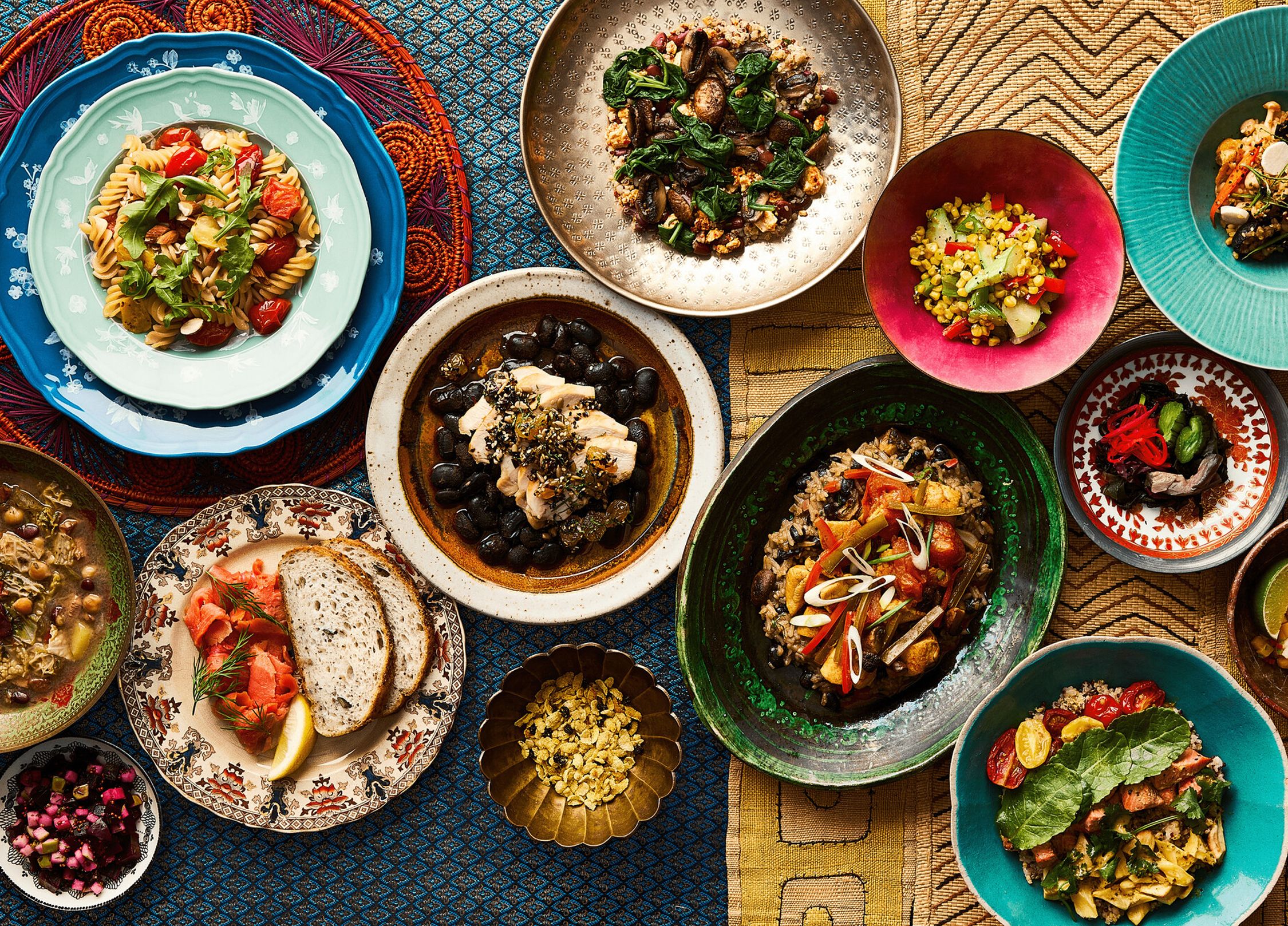 A table full of healthy fresh-cooked dishes.