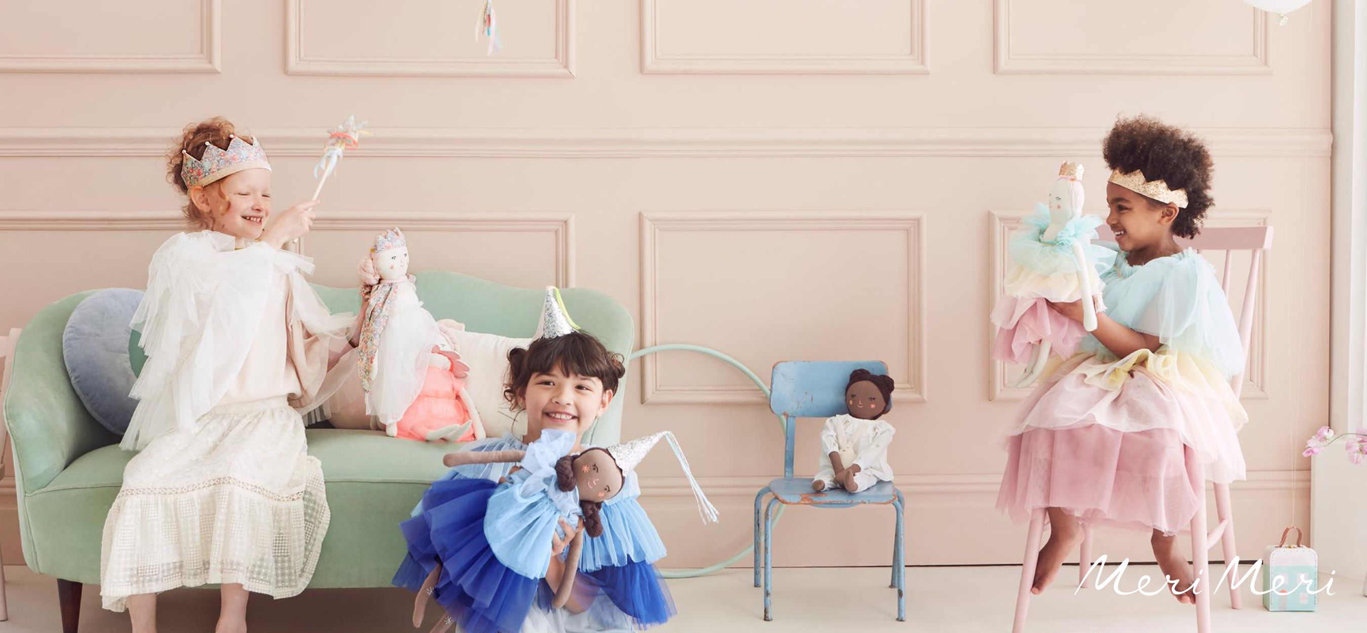 Kids playing dress-up indoors.