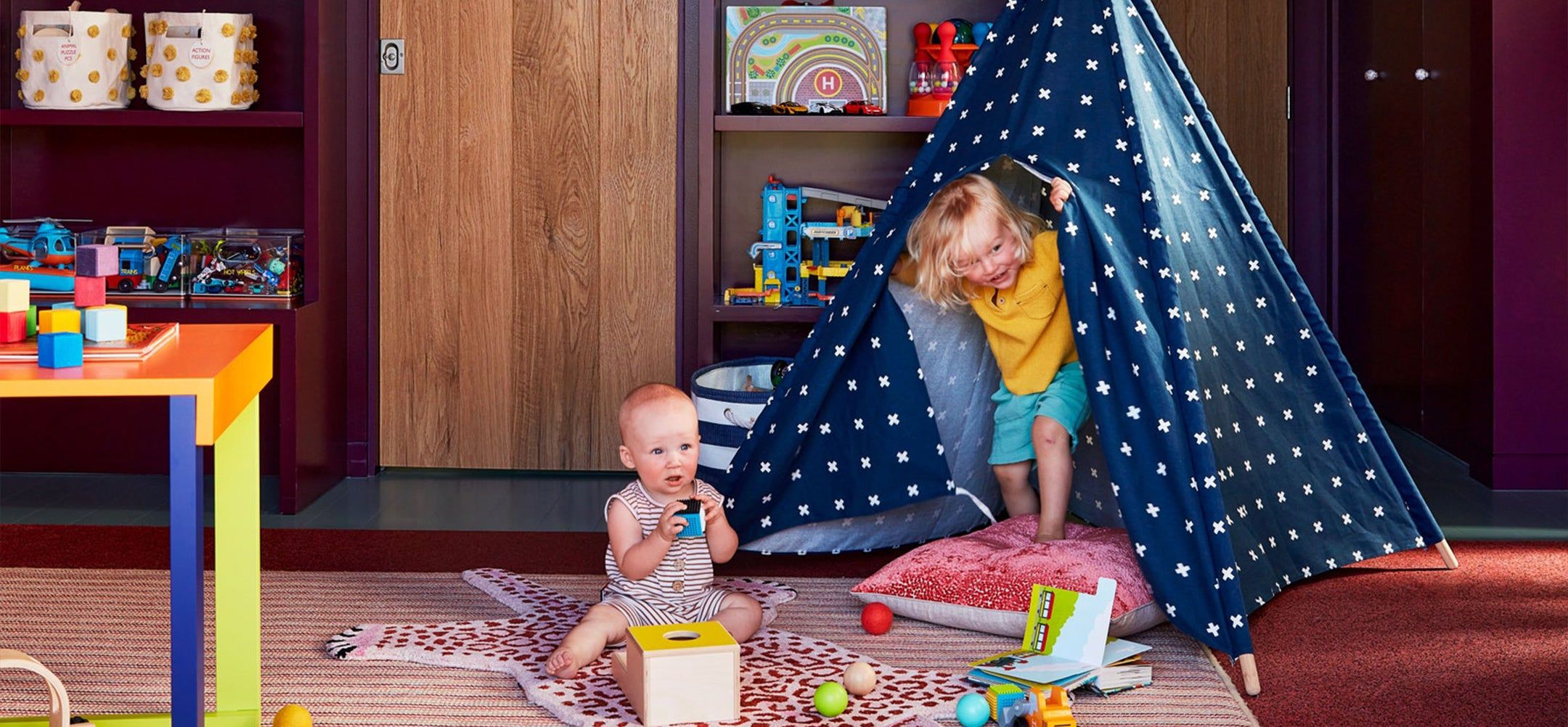 children playing in a tent