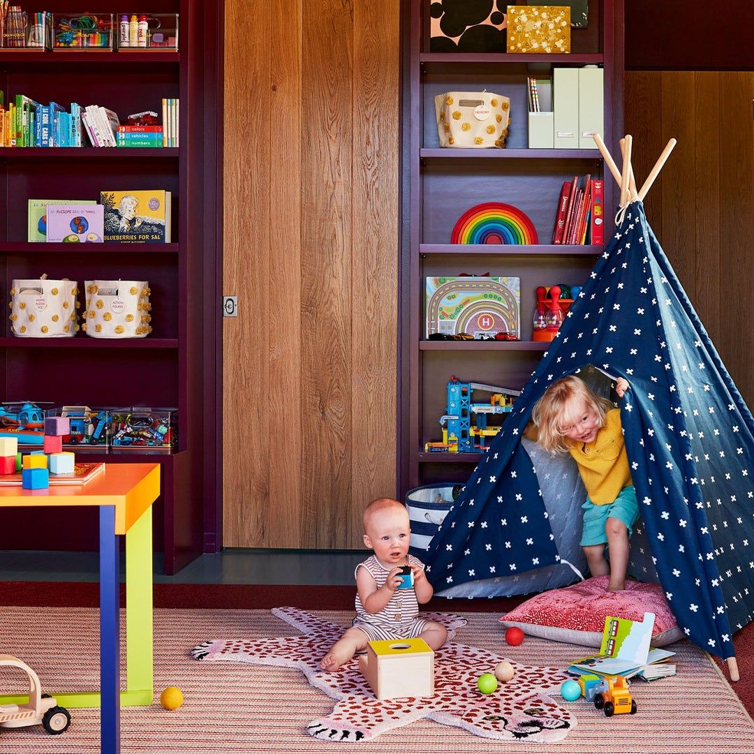 children playing in a tent
