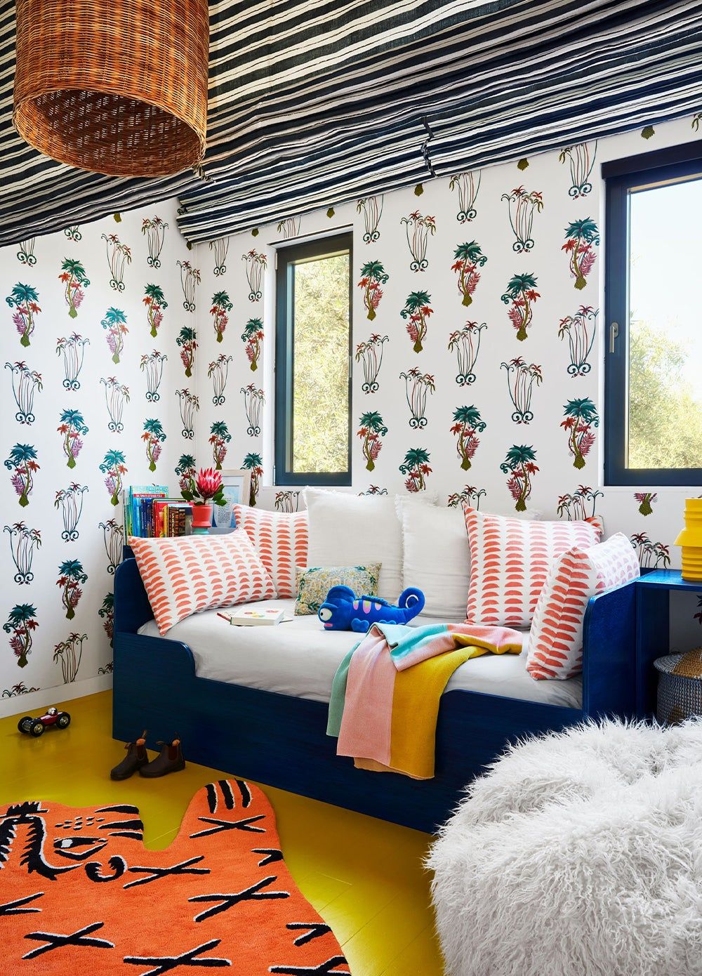 day bed with printed pillows