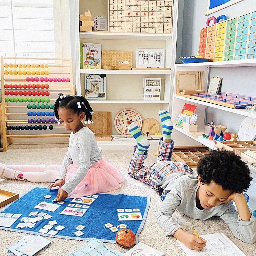 kids using a Montesorri mat 