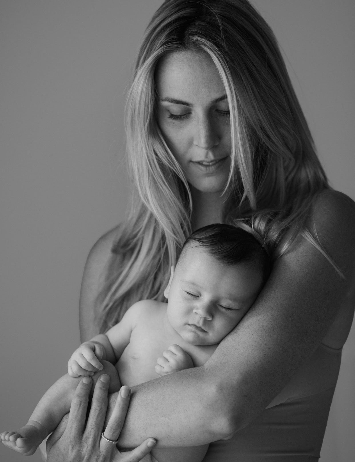 Selby Drummond holding her newborn daughter
