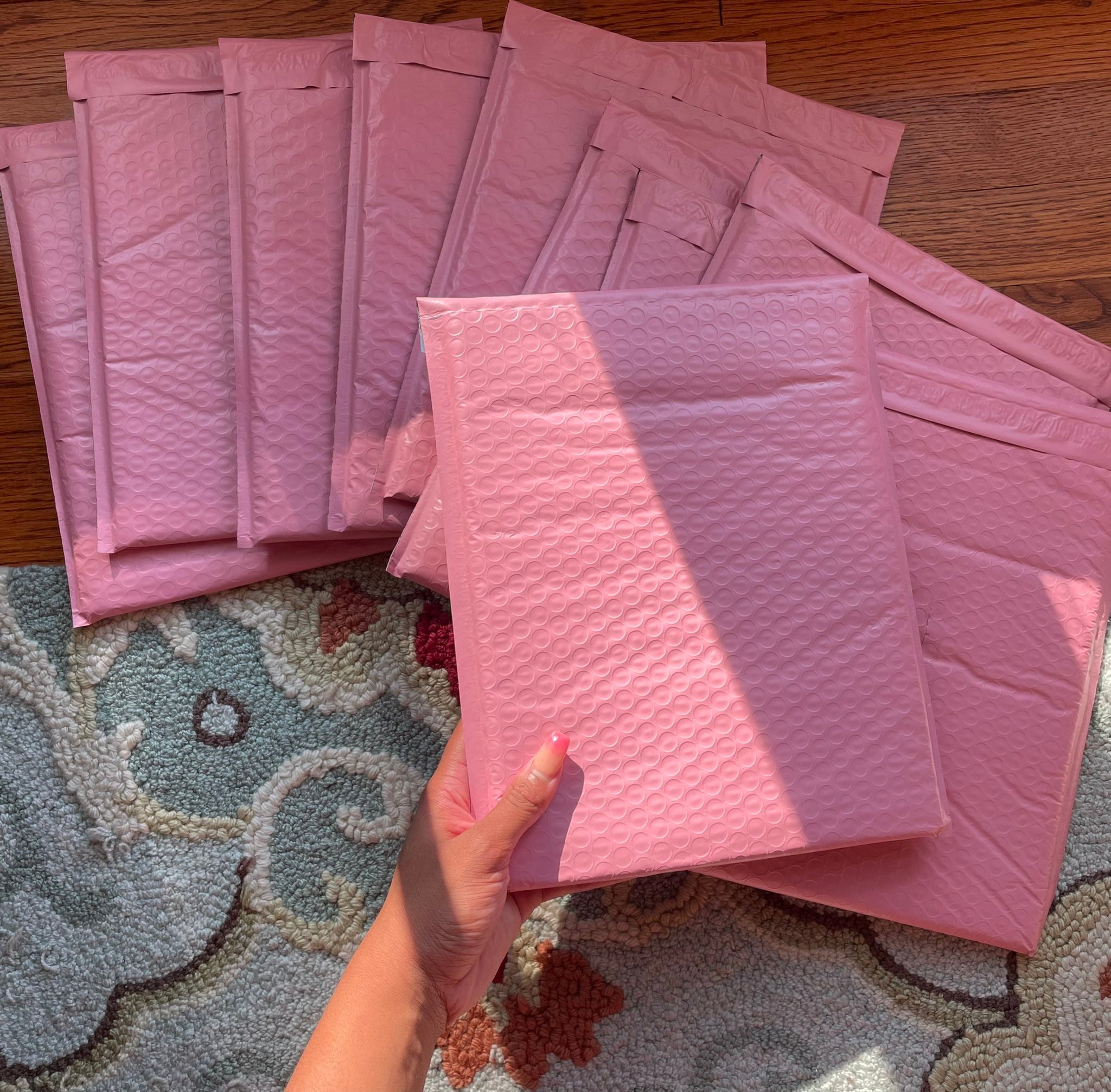 shipping our orders in pink mailers